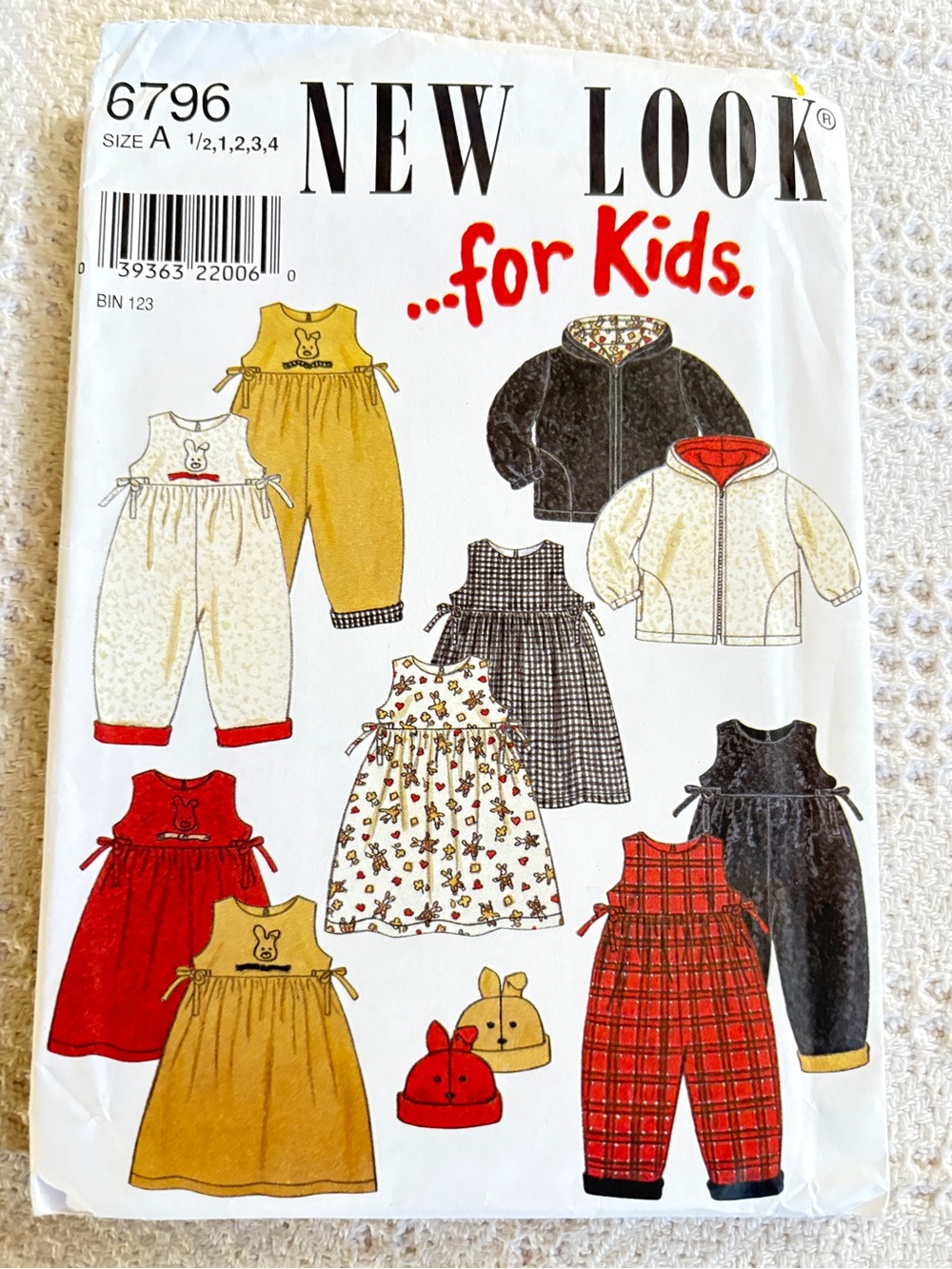 Simplicity New Look Pattern 6796 A for Kid’s Romper, Dress, Jacket and Cap